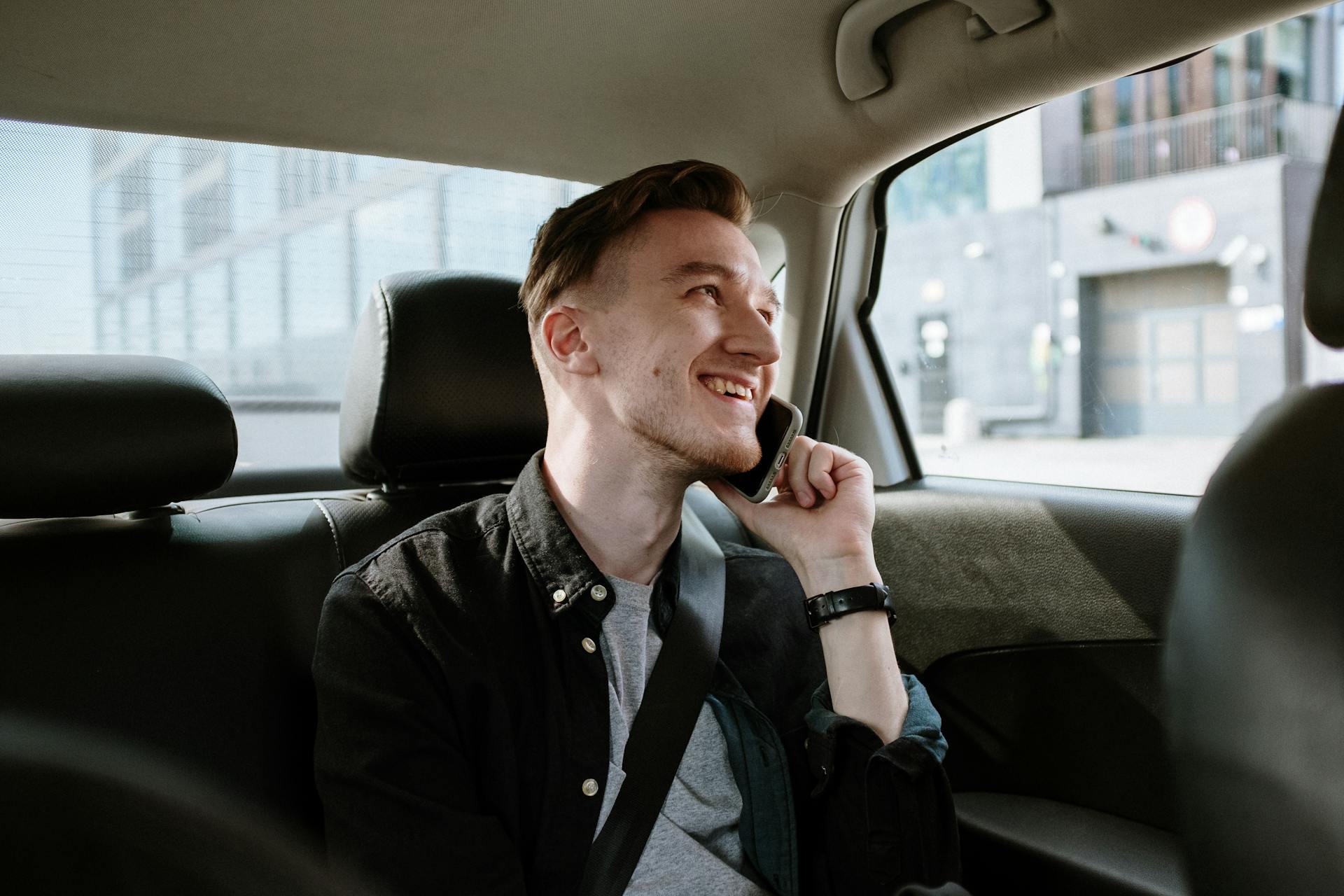 A Tourch passenger enjoying a safe, comfortable ride through the city